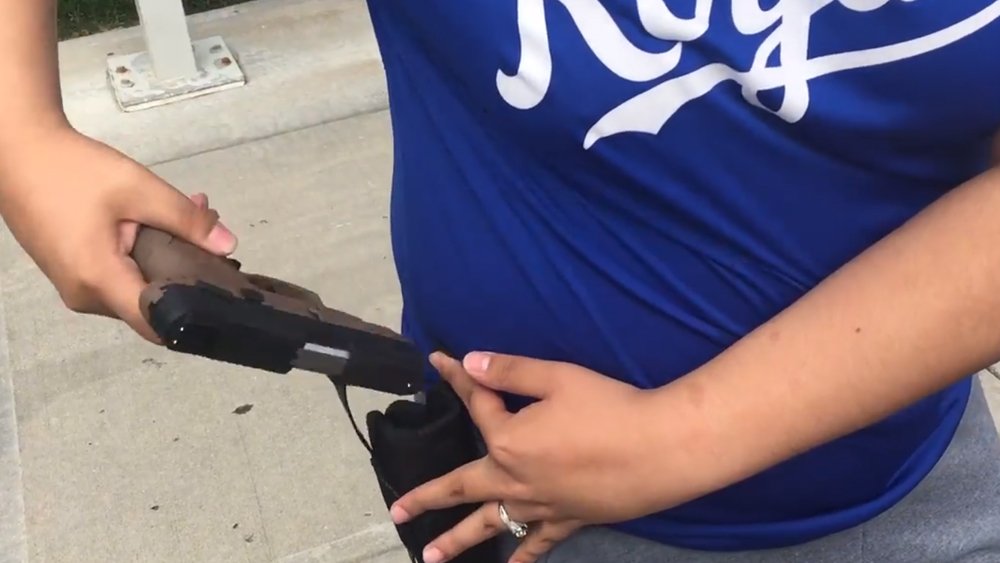 Woman Flags Herself